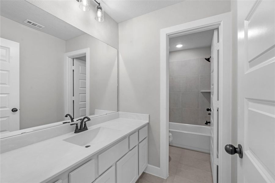 Furnished interior view inside a new home in Elyson, Katy (Image 7).