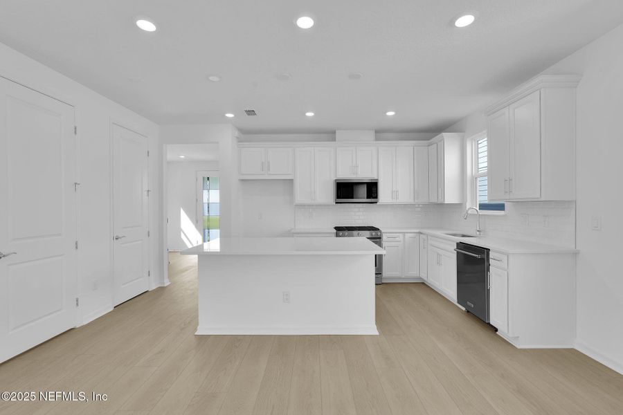 Furnished interior view inside a new home in Hawthorn Park at Wildlight, Yulee (Image 14).