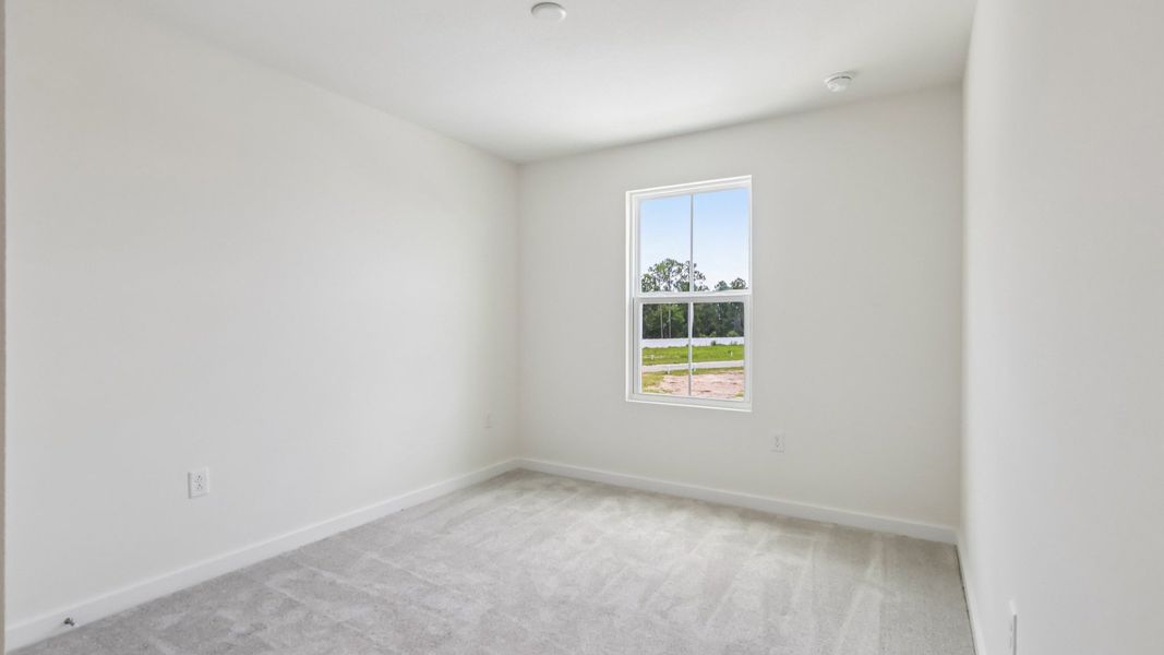 Furnished interior view inside a new home in Cyrene at Harmony, St. Cloud (Image 25).