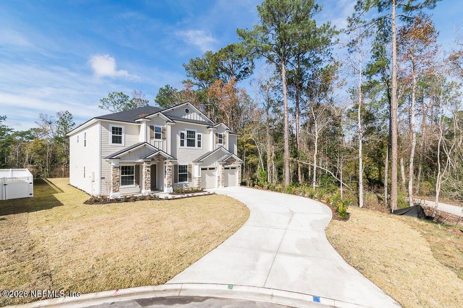 Front exterior of a new home in , St. Augustine, FL, highlighting curb appeal (Image 22).