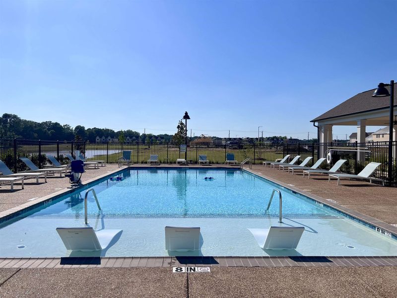 Community pool with a patio area