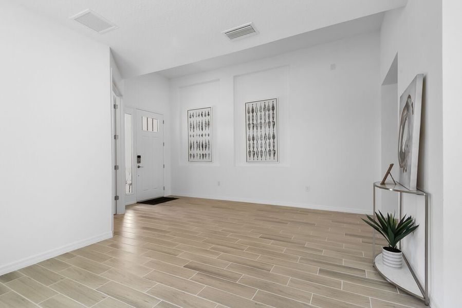 Representative unfurnished interior of a home built from the Saint Thomas by Taylor Morrison in Ardisia Park, New Smyrna Beach (Image 22).