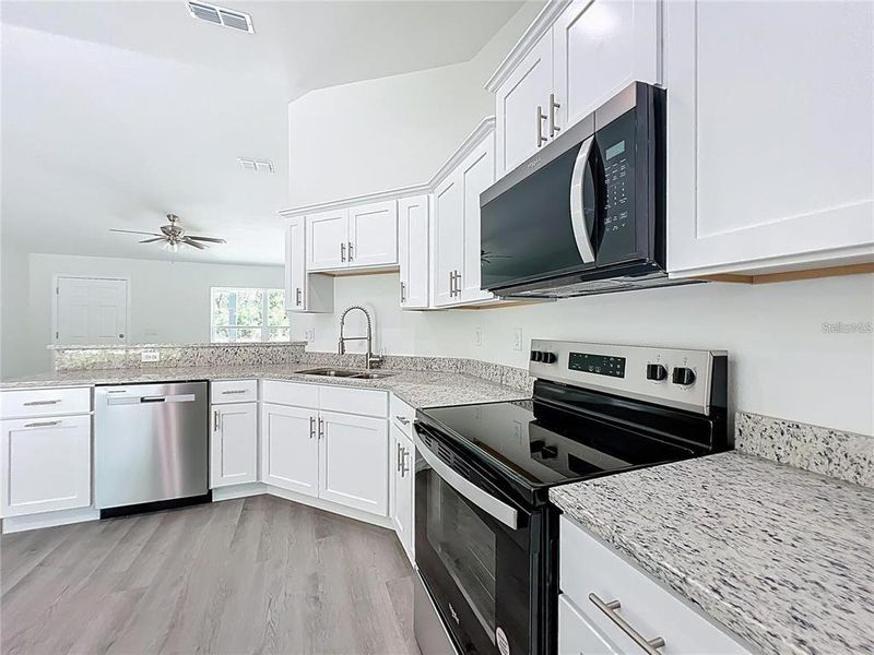 Furnished interior view inside a new home in , Dunnellon (Image 4).