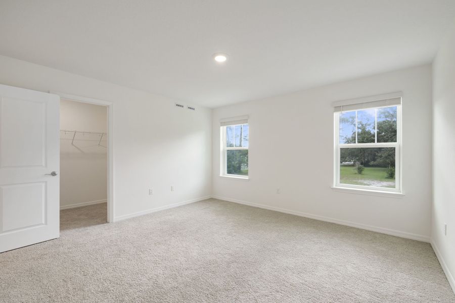 Spacious, unfurnished interior of a new home in Towns at Riverwalk, Sanford (Image 23).
