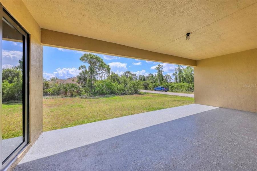 Exterior details and patio area of a home in , Port Charlotte (Image 2). Exterior details and patio area of a home in , Port Charlotte (Image 2).