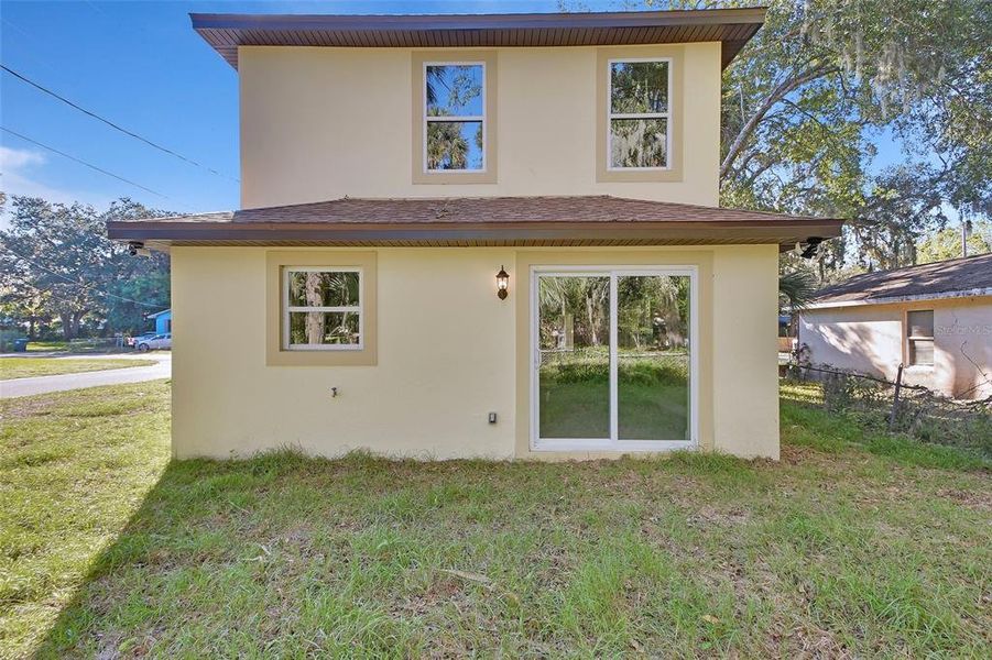 Front exterior of a new home in , Daytona Beach, FL, highlighting curb appeal (Image 19).