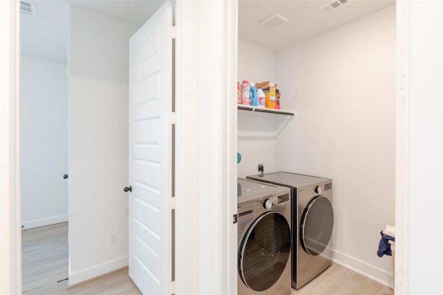 Conveniently located downstairs laundry area