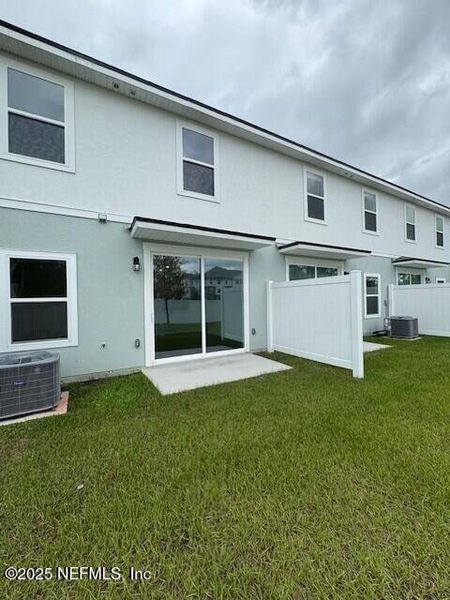 Exterior details and patio area of a home in The Landing, Middleburg (Image 2).