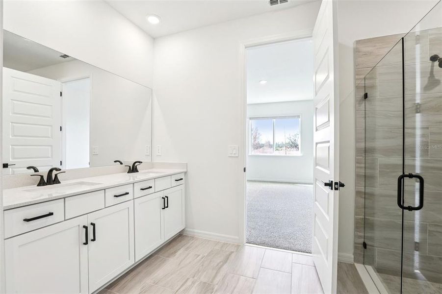 Furnished interior view inside a new home in Two Rivers - Signature Series, Zephyrhills (Image 9). Furnished interior view inside a new home in Two Rivers - Signature Series, Zephyrhills (Image 9).