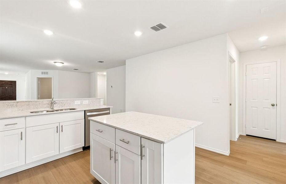 Spacious kitchen with eat-in bartop island Spacious kitchen with eat-in bartop island