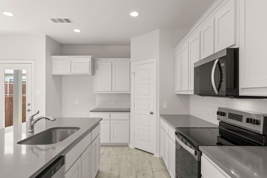 Representative exterior photo of a completed home built from the Willow by Impression Homes in ValleyBrooke, Mesquite, TX (Image 7).