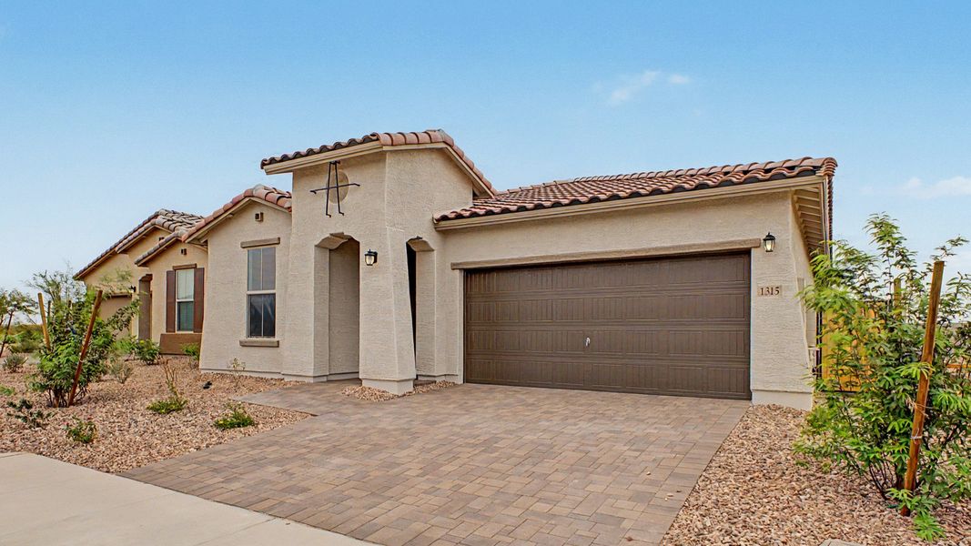 Front exterior of move-in ready single-story Clover by DRB Homes at Sienna Park, 1315 S. 215th Drive, Buckeye, Arizona 85326. Front exterior of move-in ready single-story Clover by DRB Homes at Sienna Park, 1315 S. 215th Drive, Buckeye, Arizona 85326.