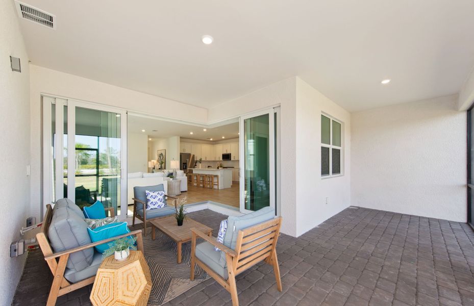 Exterior details and patio area of a home in TerraWalk at Babcock Ranch, Alva (Image 25).