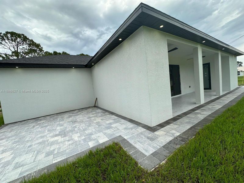 Exterior details and patio area of a home in , Lehigh Acres (Image 3).