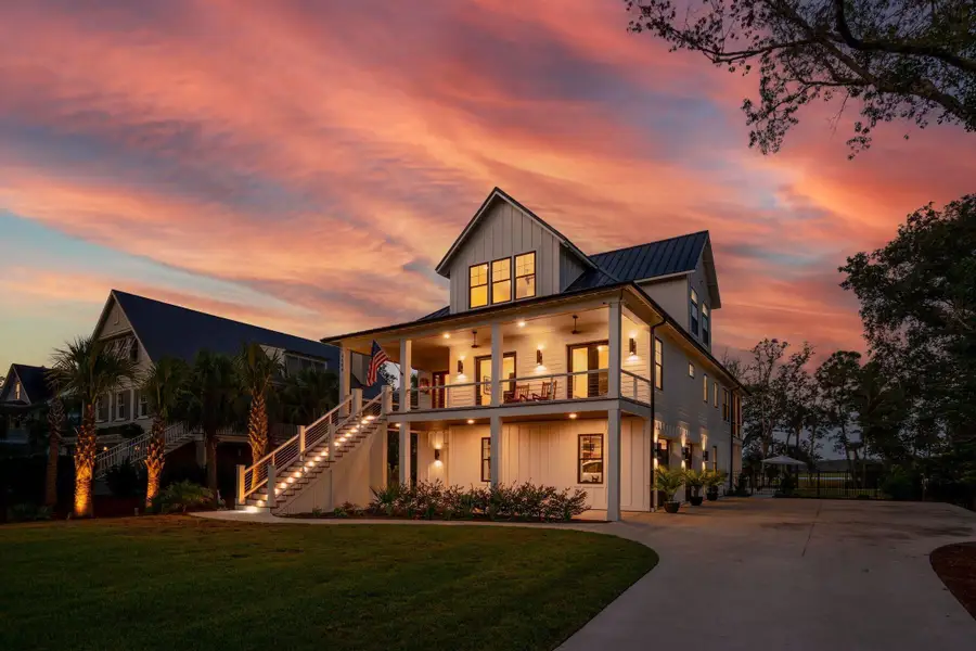 Front exterior of a new home in , Awendaw, SC, highlighting curb appeal (Image 1). Front exterior of a new home in , Awendaw, SC, highlighting curb appeal (Image 1).