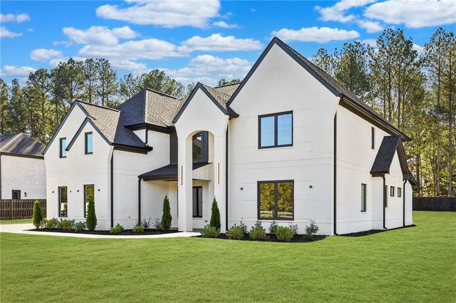 Front exterior of a new home in , Dacula, GA, highlighting curb appeal (Image 26).