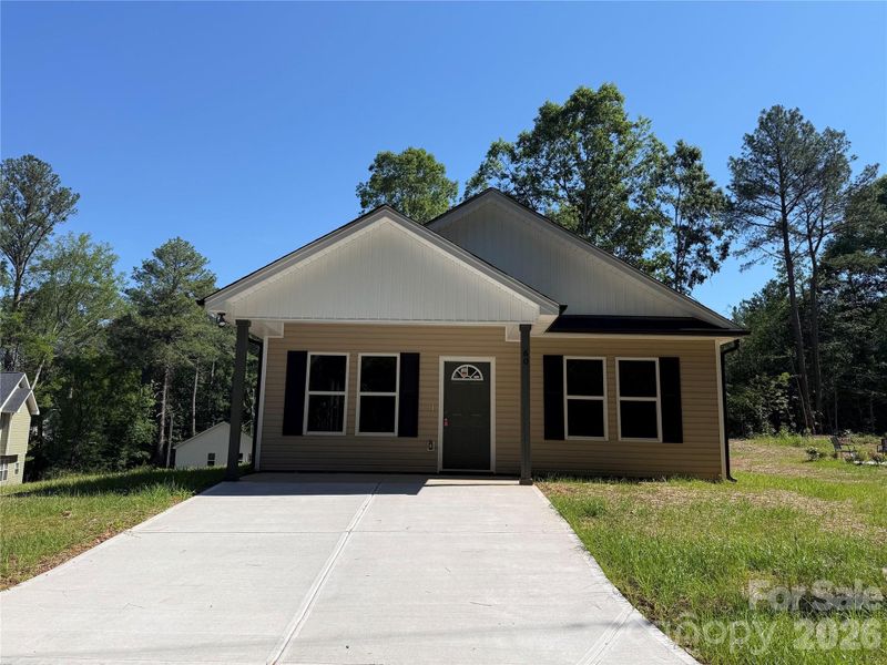 Front exterior of a new home in , Wadesboro, NC, highlighting curb appeal (Image 1). Front exterior of a new home in , Wadesboro, NC, highlighting curb appeal (Image 1).