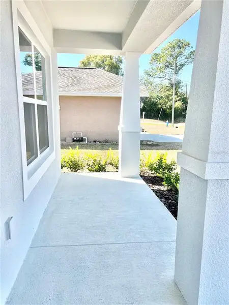 Exterior details and patio area of a home in Palm Coast, Palm Coast (Image 3).