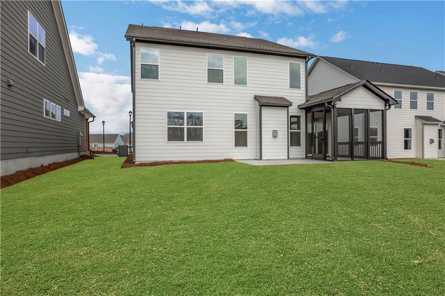Exterior details and patio area of a home in Twin Lakes, Hoschton (Image 24).