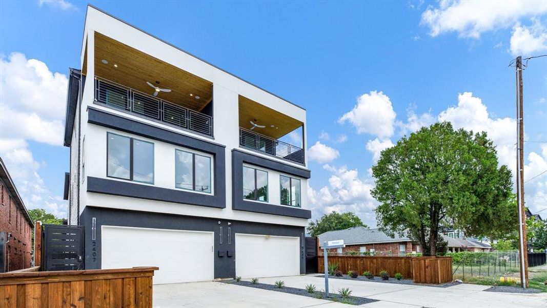 Contemporary house with a garage and a balcony