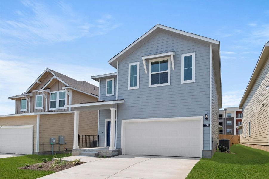 Front exterior of a new home in Edgebrooke, Pflugerville, TX, highlighting curb appeal (Image 26). Front exterior of a new home in Edgebrooke, Pflugerville, TX, highlighting curb appeal (Image 26).