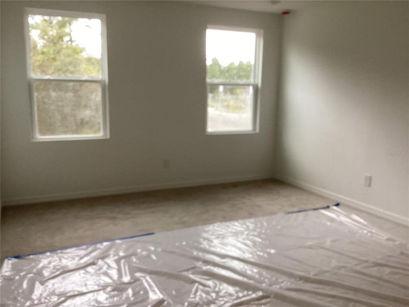 In-progress construction of a new home in Ellington Traditional, St. Cloud, FL (Image 19).