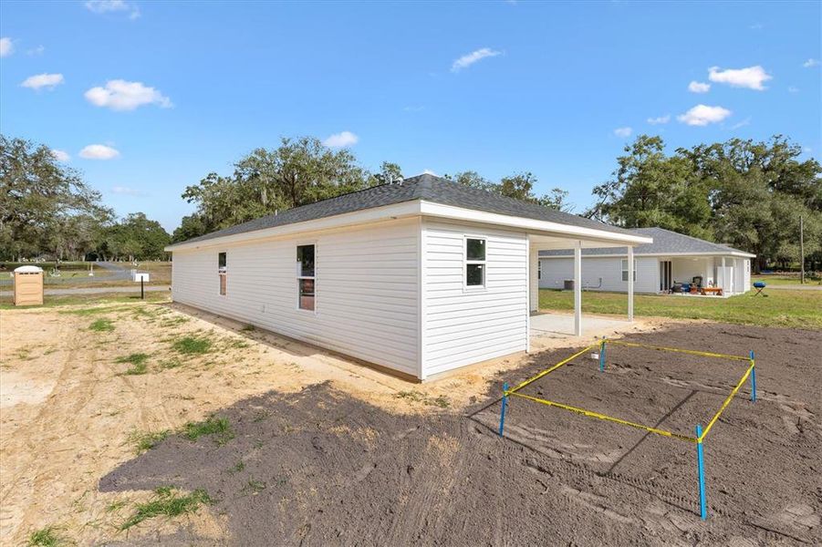 Exterior details and patio area of a home in , Bushnell (Image 3).