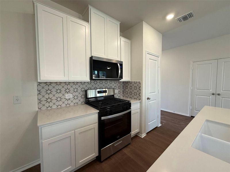 Furnished interior view inside a new home in River Bluff, Leander (Image 8).