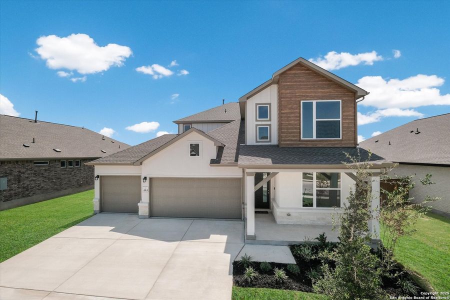 Front exterior of a new home in Foxbrook, Cibolo, TX, highlighting curb appeal (Image 24).