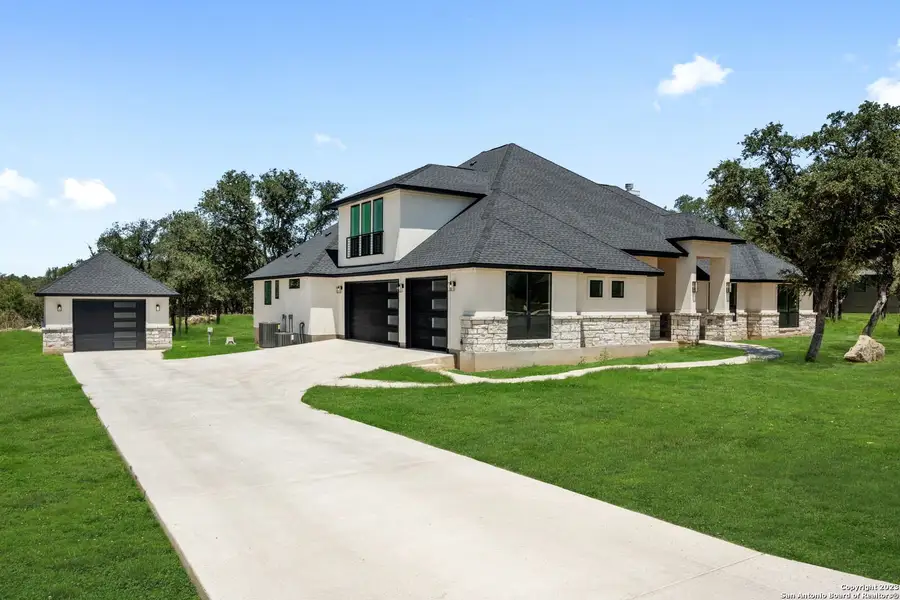 Front exterior of a new home in , Castroville, TX, highlighting curb appeal (Image 1).