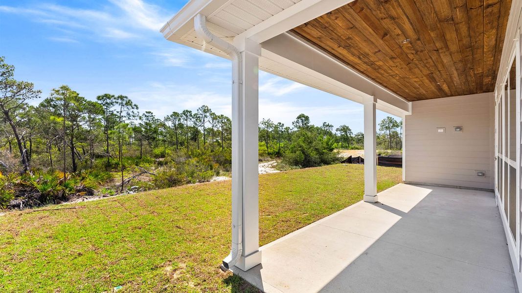 Exterior details and patio area of a home in WindMark Beach, Port Saint Joe (Image 20).
