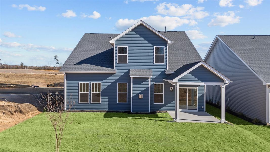 First-class design featuring a rear covered porch and tasteful architectural details