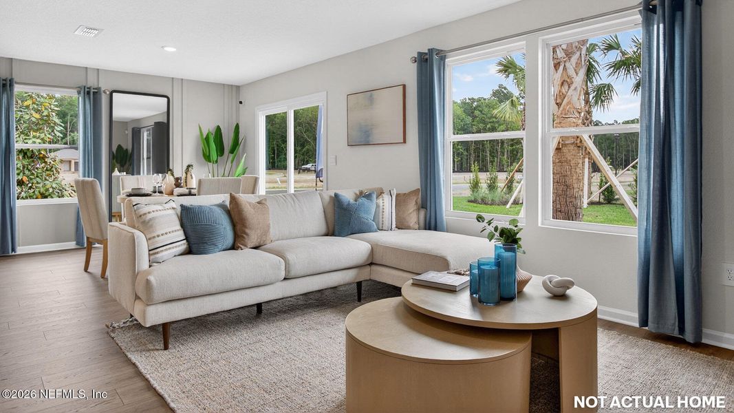 Furnished interior view inside a new home in Sawmill Branch, Palm Coast (Image 8). Furnished interior view inside a new home in Sawmill Branch, Palm Coast (Image 8).