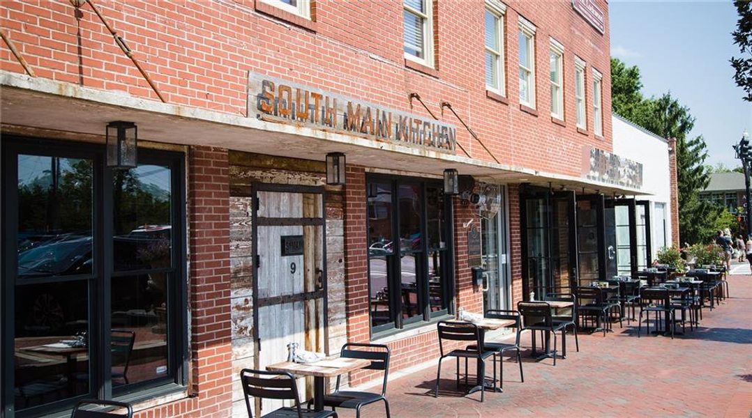 Front exterior of a new home in Byers Park, Alpharetta, GA, highlighting curb appeal (Image 29).