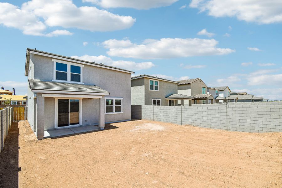 A house with a dirt yard. A house with a dirt yard.