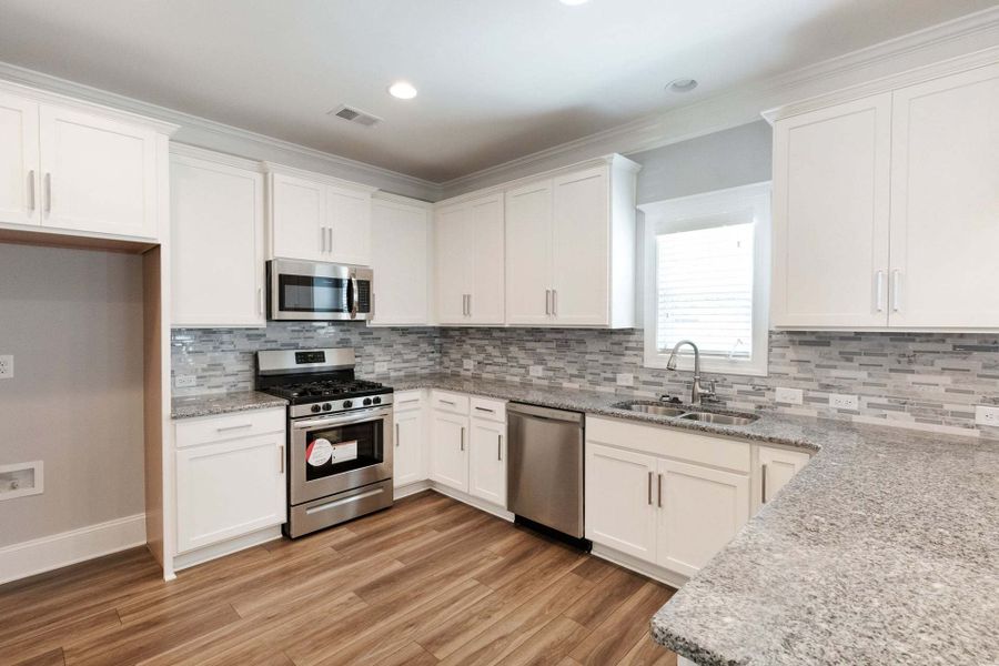 Representative furnished interior of a home built from the Meadowbrook by Caviness & Cates Communities in Sutherland Station at Olde Liberty, Franklinton (Image 149). Representative furnished interior of a home built from the Meadowbrook by Caviness & Cates Communities in Sutherland Station at Olde Liberty, Franklinton (Image 149).