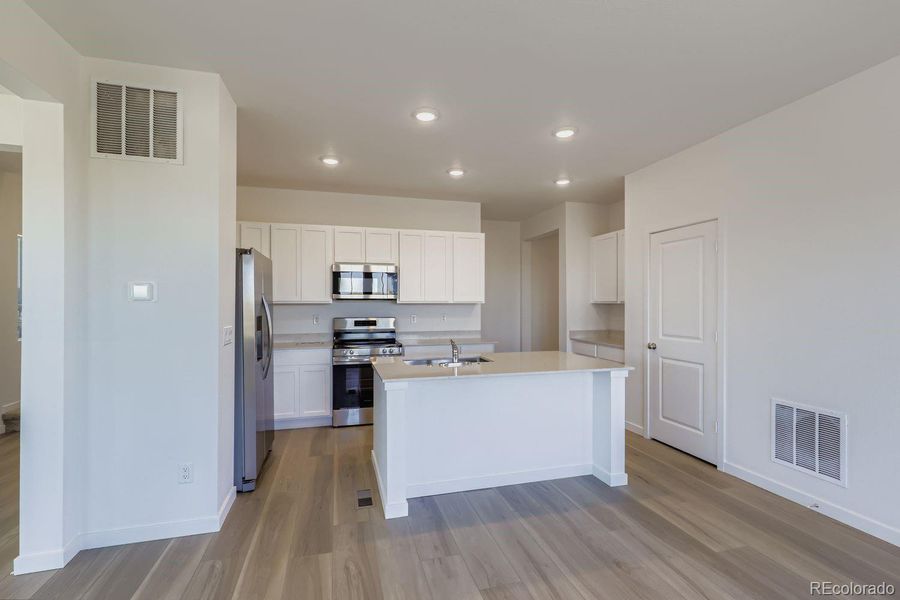 Furnished interior view inside a new home in , Thornton (Image 4).