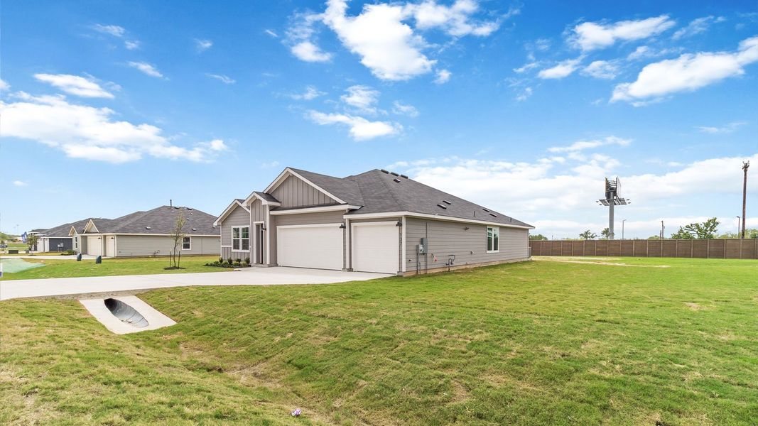 Front exterior of a new home in Railhead, Cedar Creek, TX, highlighting curb appeal (Image 16). Front exterior of a new home in Railhead, Cedar Creek, TX, highlighting curb appeal (Image 16).