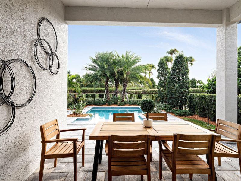 Exterior details and patio area of a home in PGA Village Verano, Port St. Lucie (Image 3).