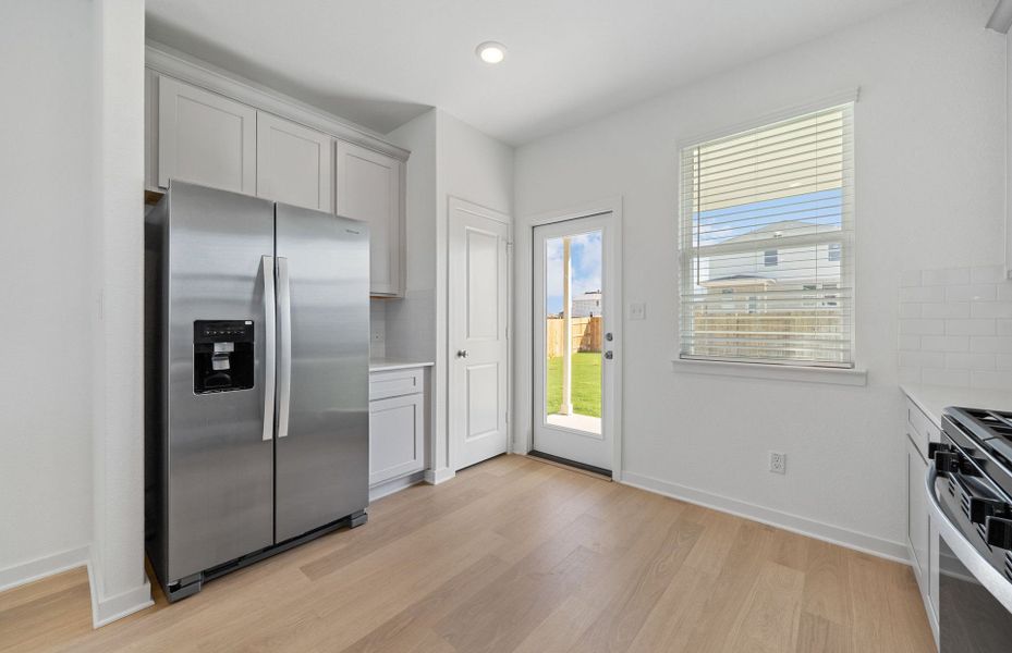 Furnished interior view inside a new home in Sunfield, Buda (Image 3).