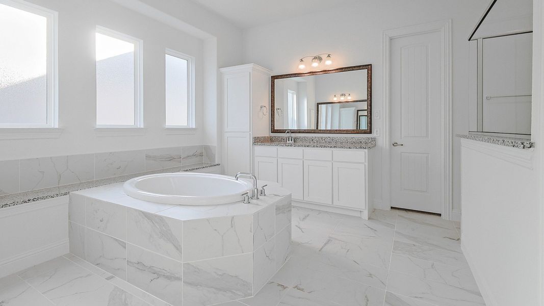 Representative furnished interior of a home built from the Villanova by Brightland Homes in Katy Lakes, Katy (Image 10).