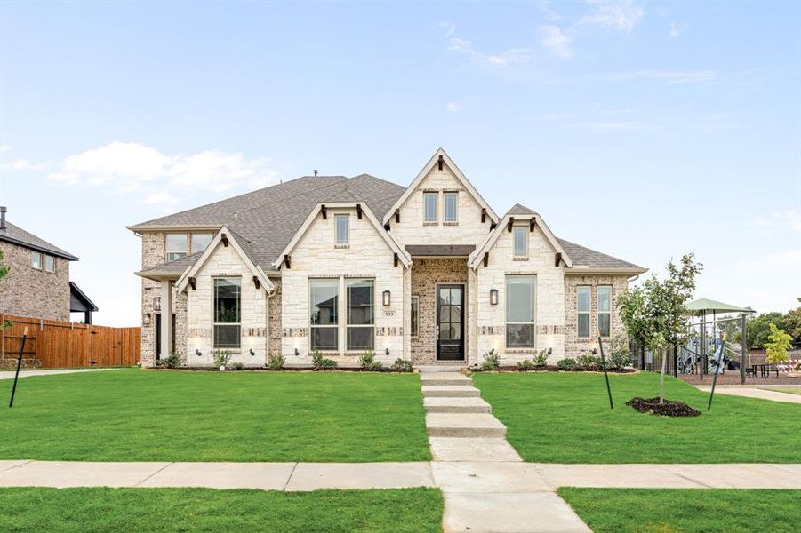 Front exterior of a new home in Mockingbird Heights Classic 60, Midlothian, TX, highlighting curb appeal (Image 2).