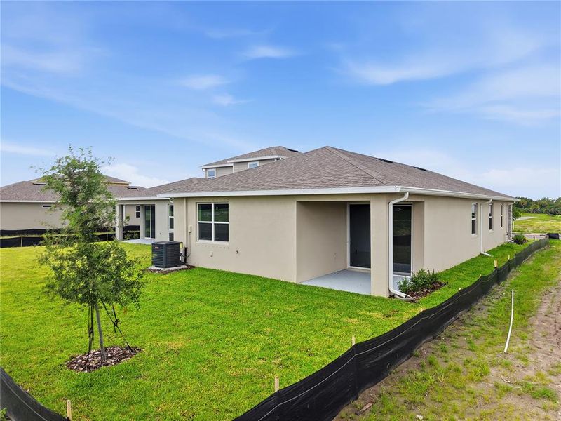 Exterior details and patio area of a home in Estates at Rivers Edge, Parrish (Image 27).
