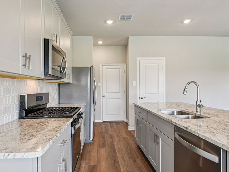 Furnished interior view inside a new home in Parks at Foster Crossing - Signature Series, Anna (Image 5). Furnished interior view inside a new home in Parks at Foster Crossing - Signature Series, Anna (Image 5).