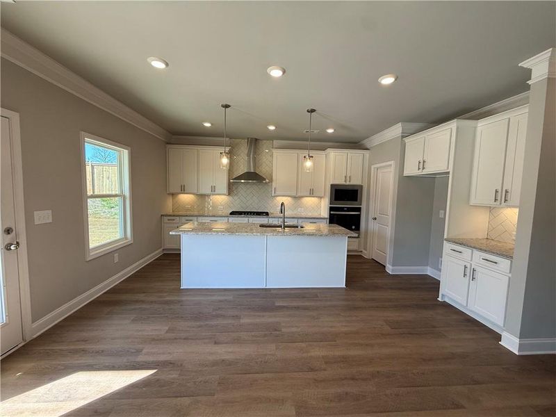 Furnished interior view inside a new home in Hidden Fields, Hoschton (Image 6).