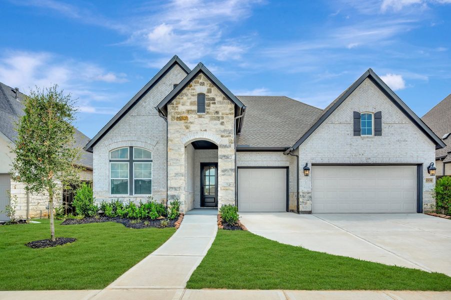 Front exterior of a new home in Riceland - Summit Collection, Mont Belvieu, TX, highlighting curb appeal (Image 21).