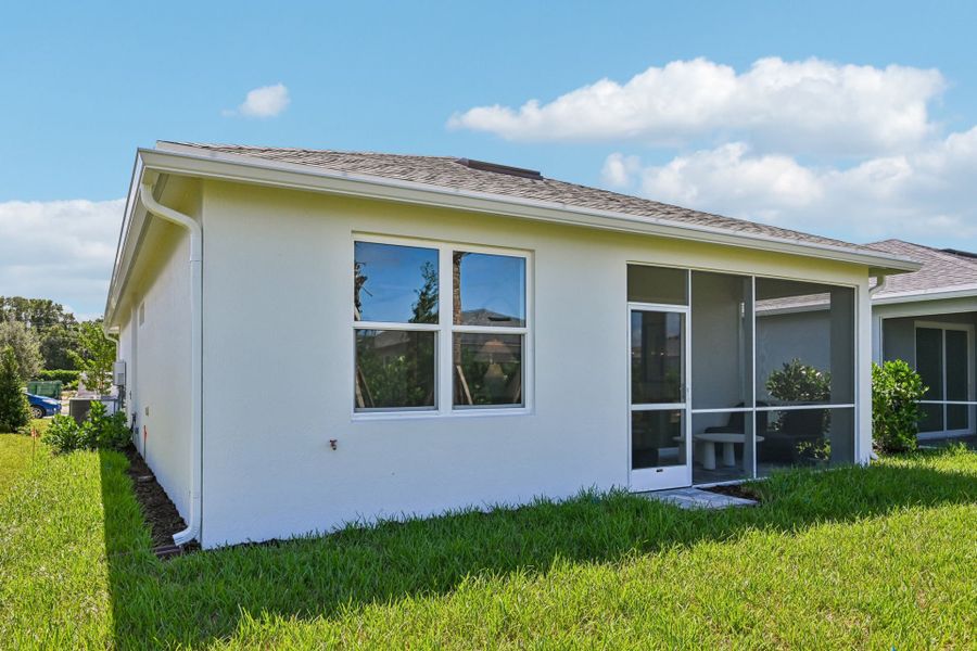 Exterior details and patio area of a home in Harbor Isle, Vero Beach (Image 33).