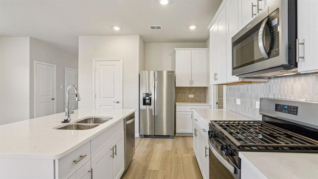 Furnished interior view inside a new home in Eastridge - Spring Series, McKinney (Image 9). Furnished interior view inside a new home in Eastridge - Spring Series, McKinney (Image 9).