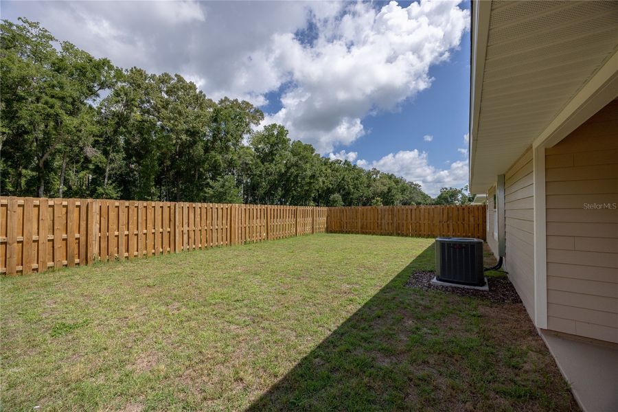 Exterior details and patio area of a home in Savannah Station, Alachua (Image 4).