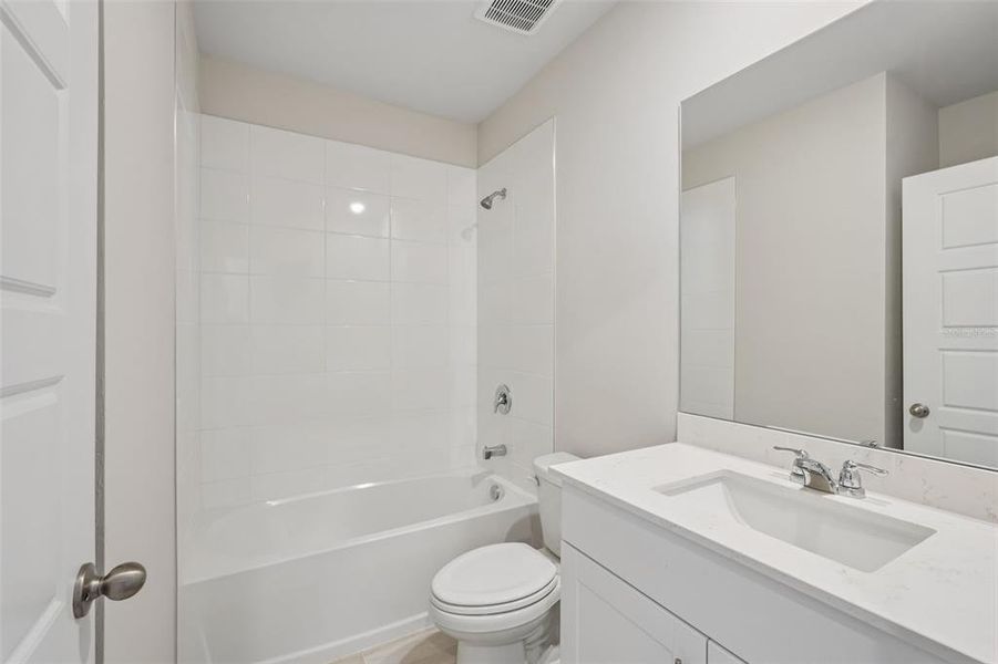 Furnished interior view inside a new home in Crescent Lakes - Premier Series, Punta Gorda (Image 8).